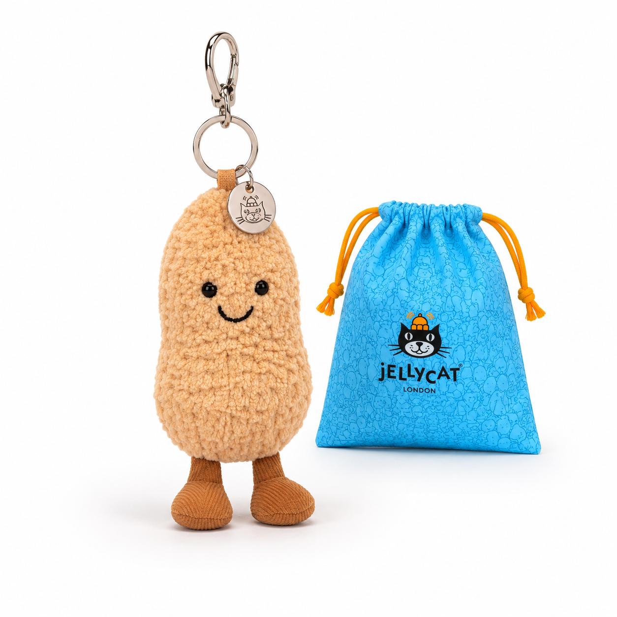 Plush keychain with a blue drawstring bag featuring logo on a dust bag 
